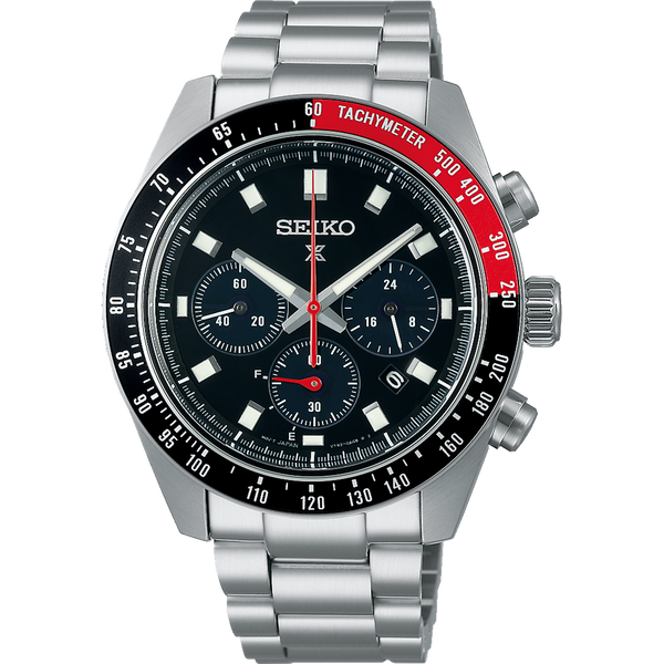 Seiko chronograph wristwatch with a black dial and red accents on a stainless steel bracelet.