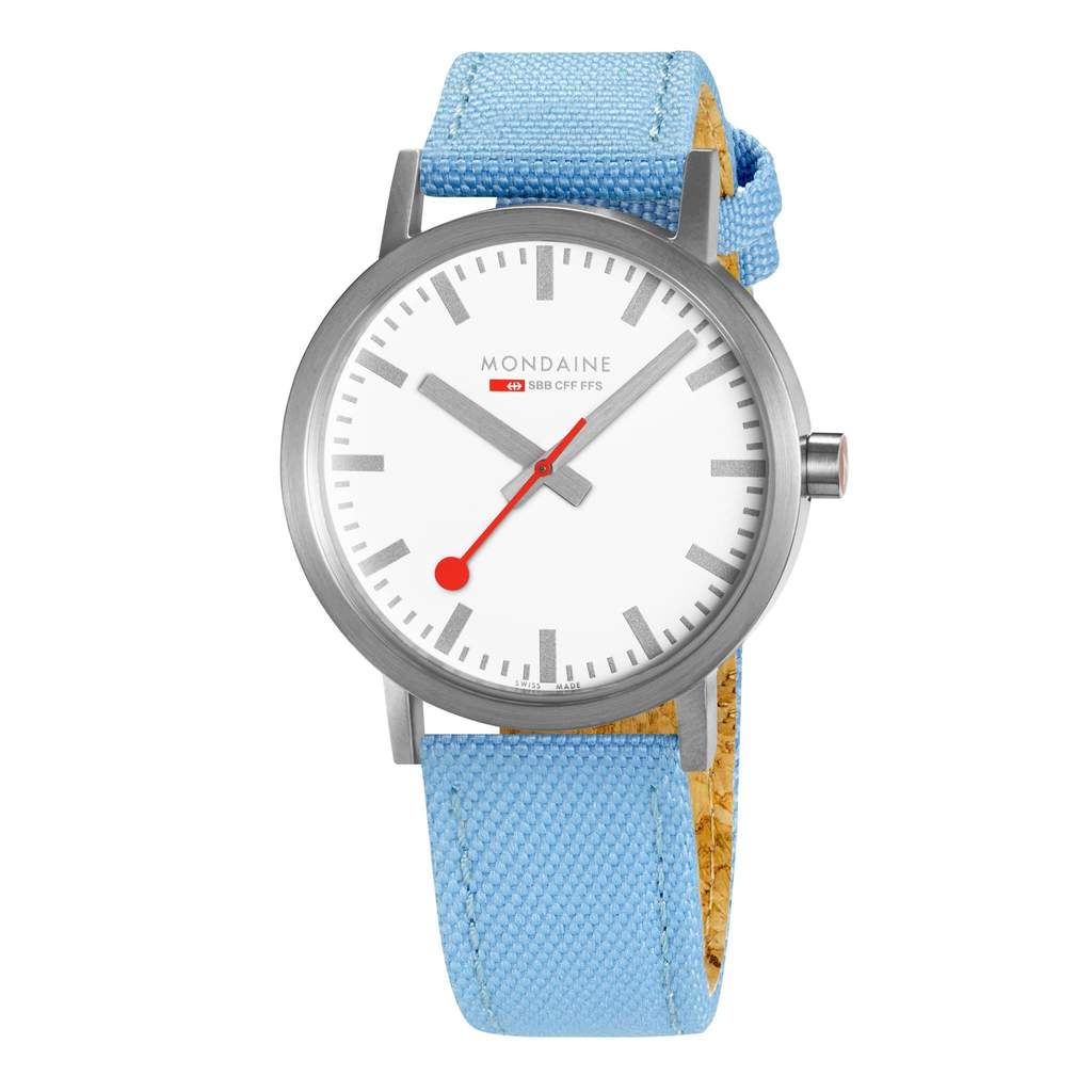 Wristwatch with a white face, silver case, and light blue fabric strap.
