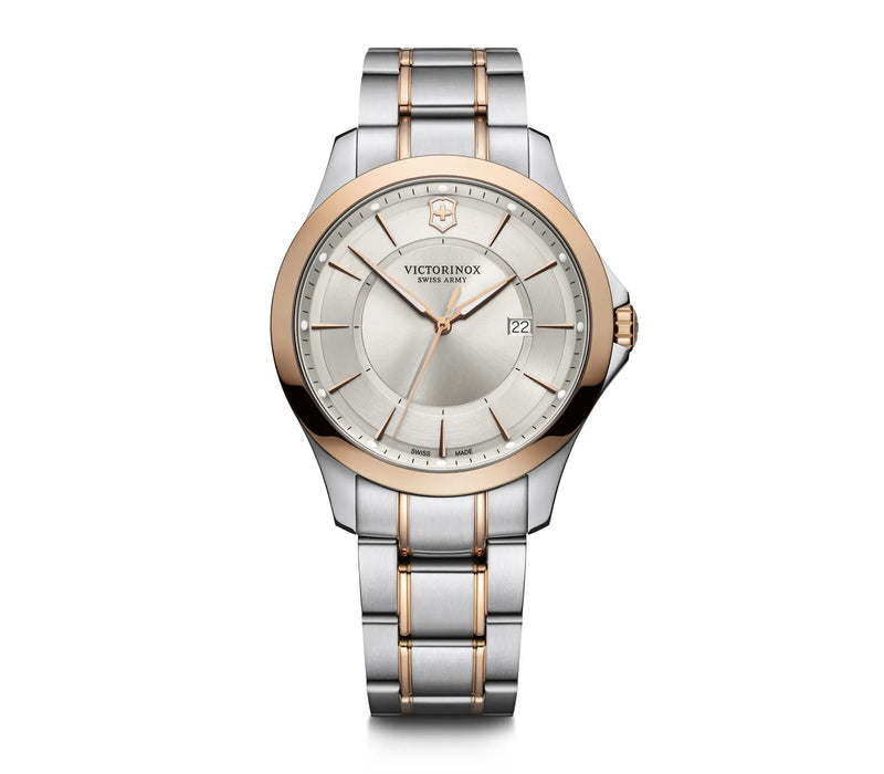 Two-tone stainless steel and rose gold wristwatch with a silver dial.