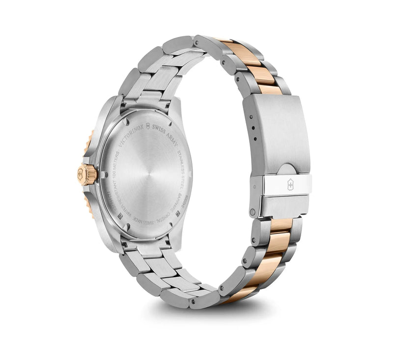 Wristwatch with a two-tone metal bracelet band.