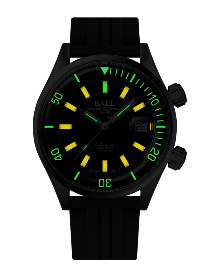 Black wristwatch with luminous green and yellow markings on the dial.