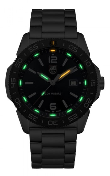 Black wristwatch with luminous green and yellow markings on the dial.