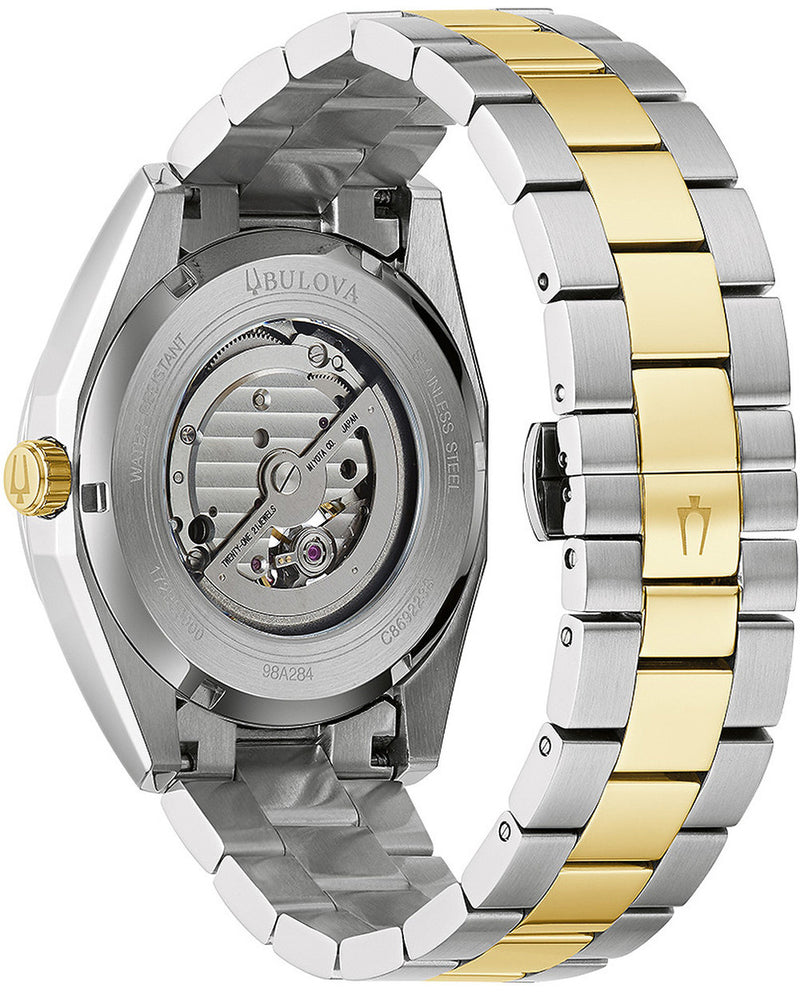 Luxury wristwatch with a visible mechanical movement through the transparent case back.