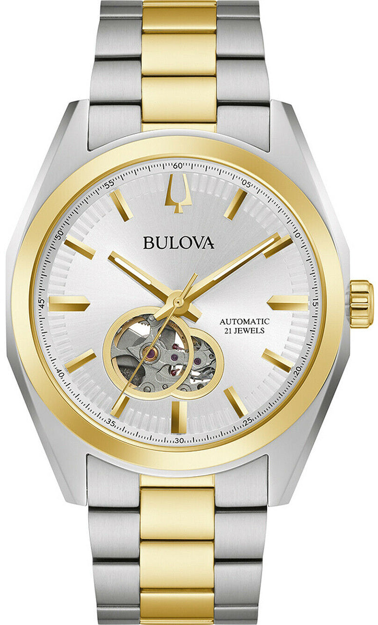 Two-tone gold and silver Bulova wristwatch with an exposed mechanical movement visible on the dial.