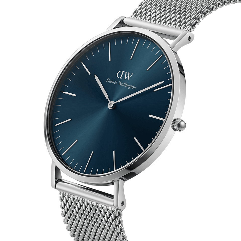 Sleek wristwatch with a blue dial and silver mesh band.