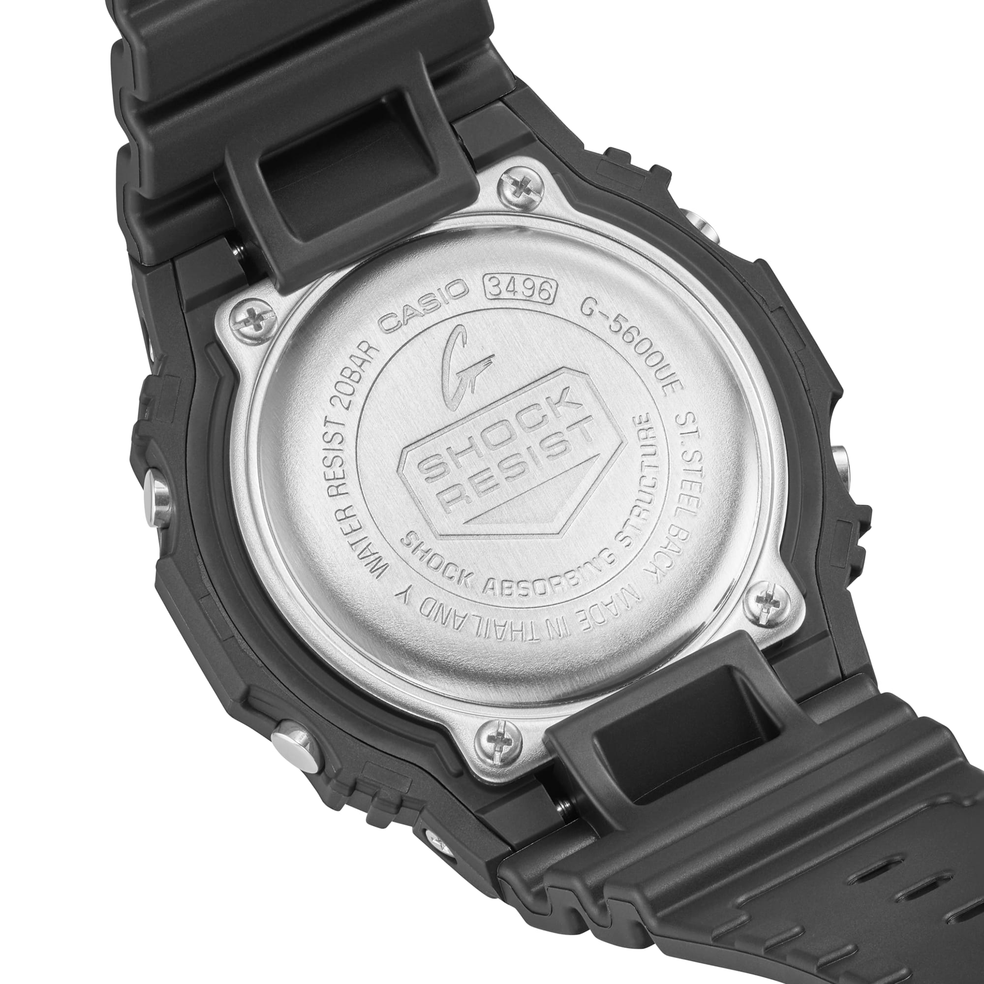 Back of a black digital wristwatch showing the metal case back with engraved text and logo.
