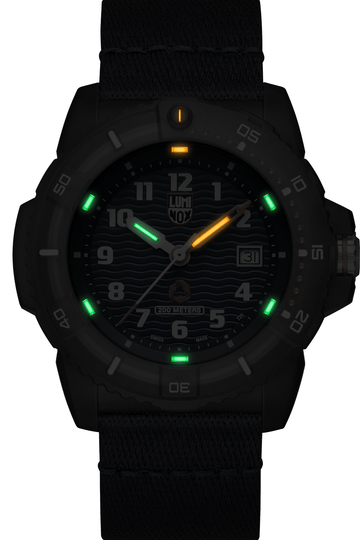 Black tactical wristwatch with luminous markings on the dial.