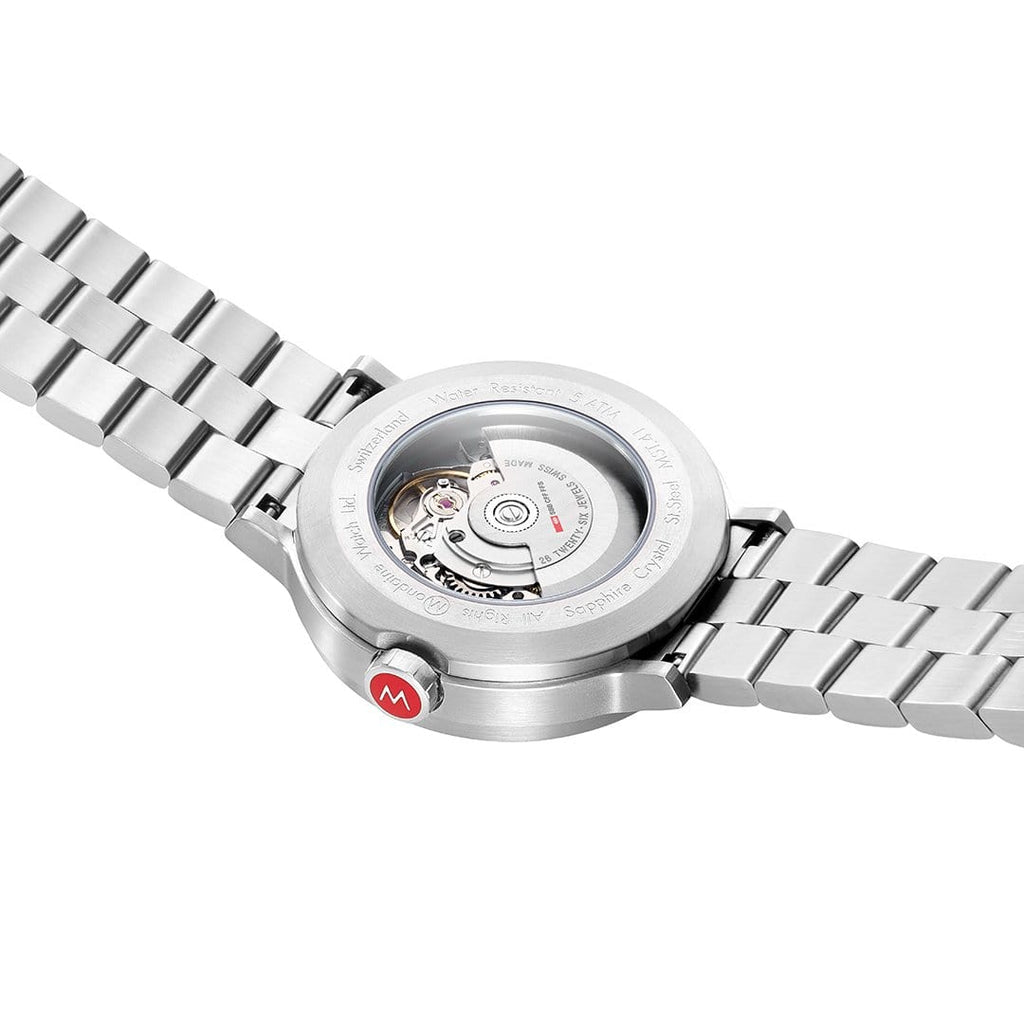 Stainless steel wristwatch with visible mechanical movement through a transparent case back.