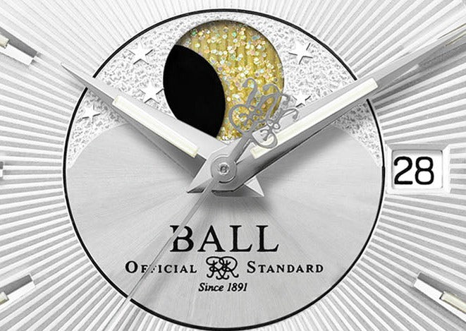 Stylized watch face featuring a moon phase complication and ’BALL’ branding.