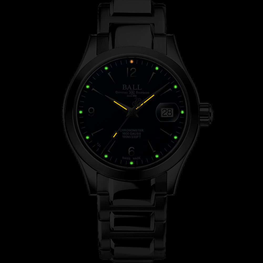 Sleek black wristwatch with luminous hands and hour markers.