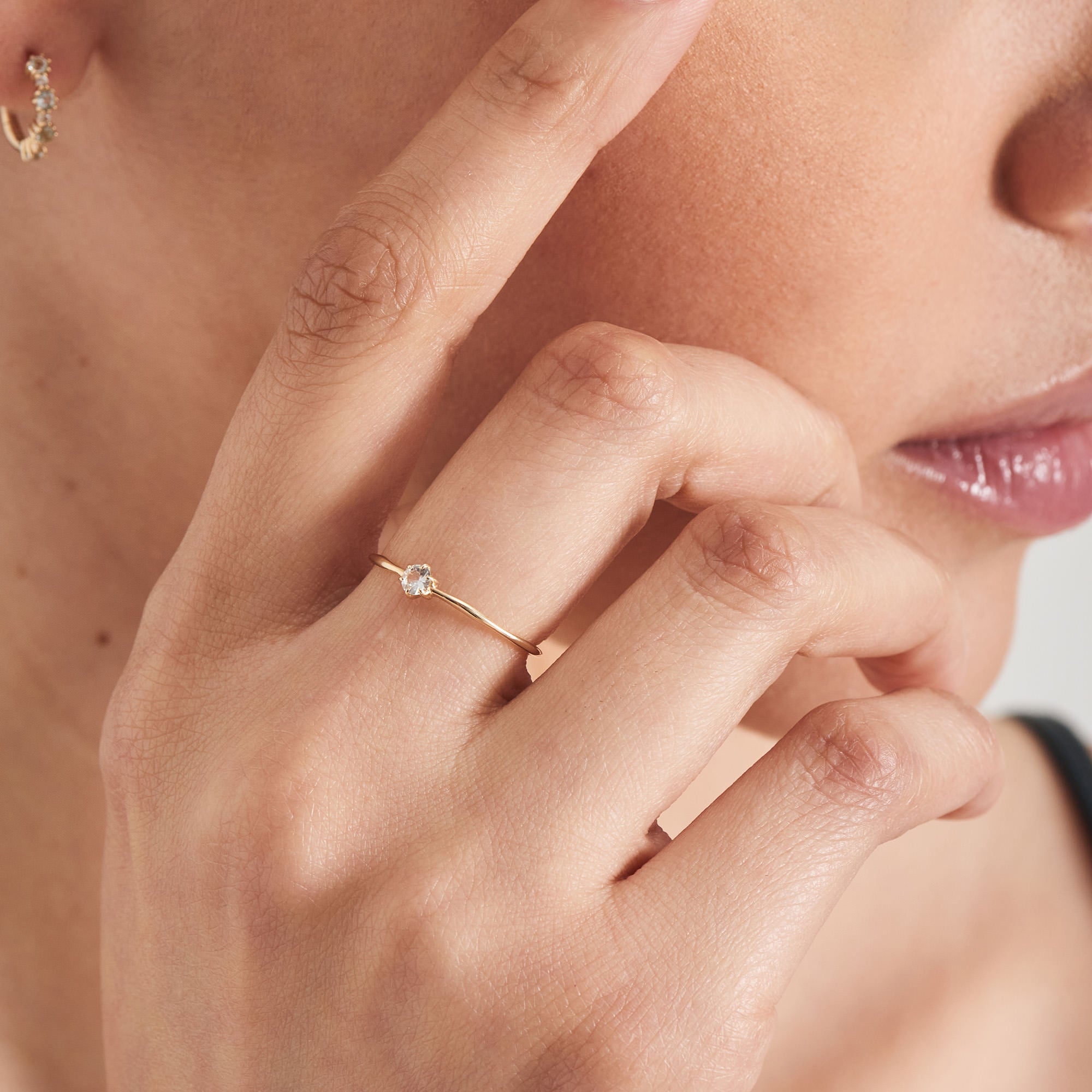 Ania Haie's Luxurious 14kt Gold Band Ring with Pristine White Sapphire