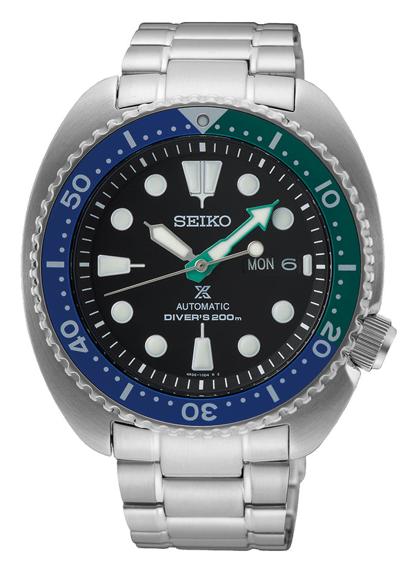 Seiko dive watch with a blue and green bezel and stainless steel bracelet.