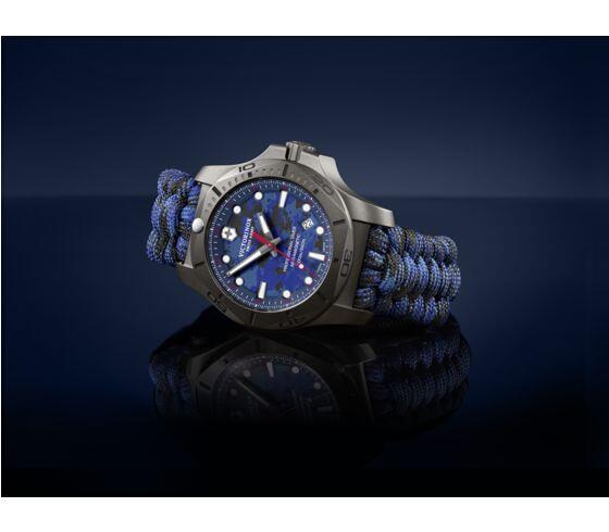 Rugged wristwatch with a blue dial and woven paracord-style band.