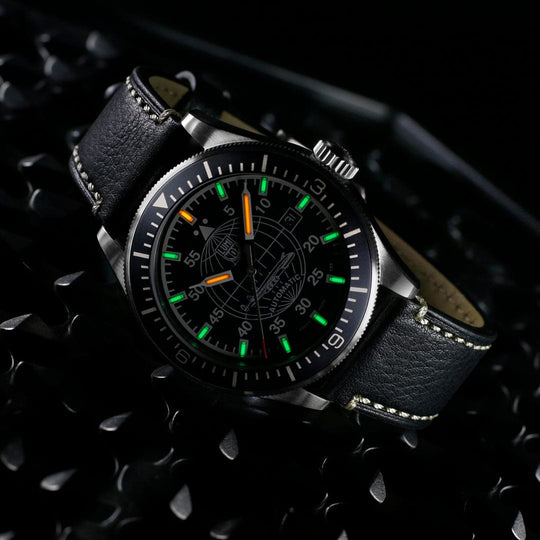 Stylish black wristwatch with luminous green and orange markings on the dial.