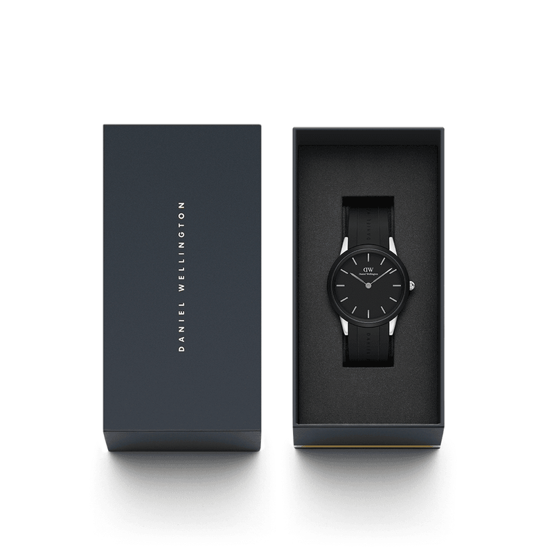 Sleek black wristwatch in an open presentation box.