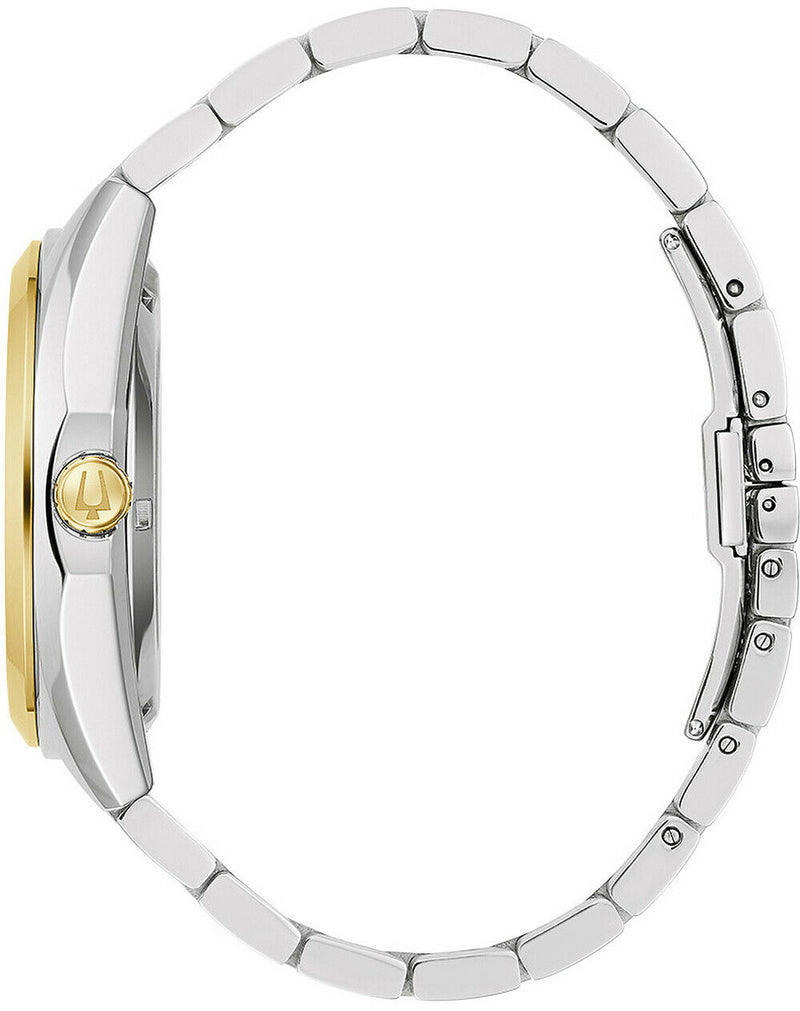 Wristwatch with a silver metal band and gold accents on the case.